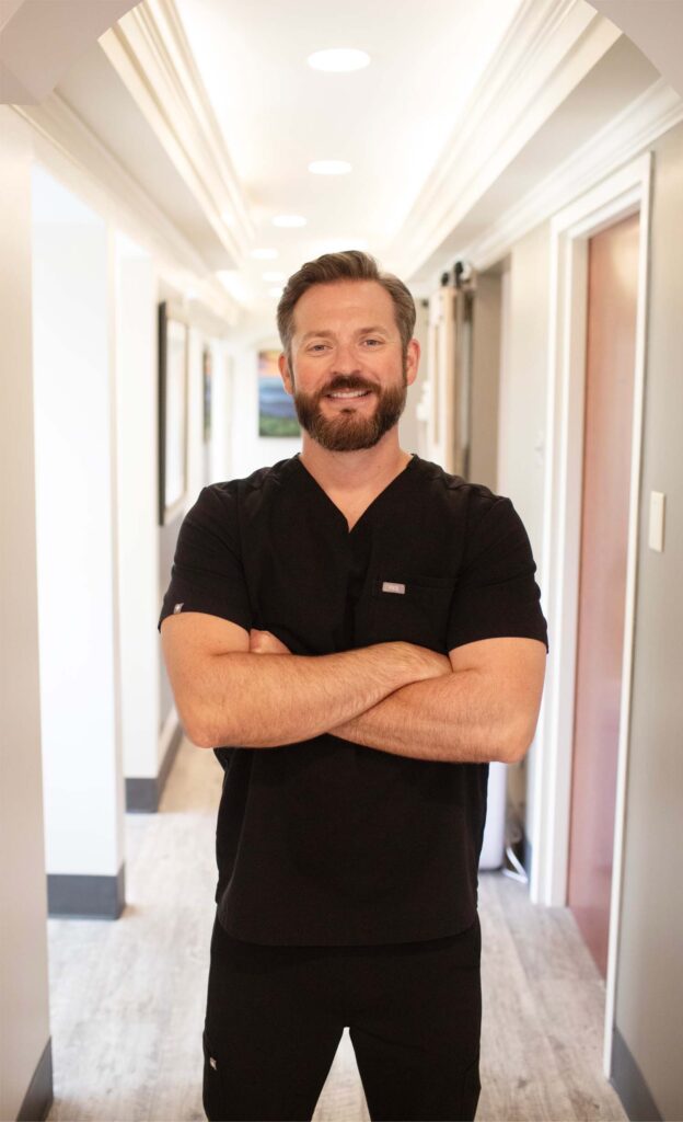 headshot of Dr. Hall in a hallway