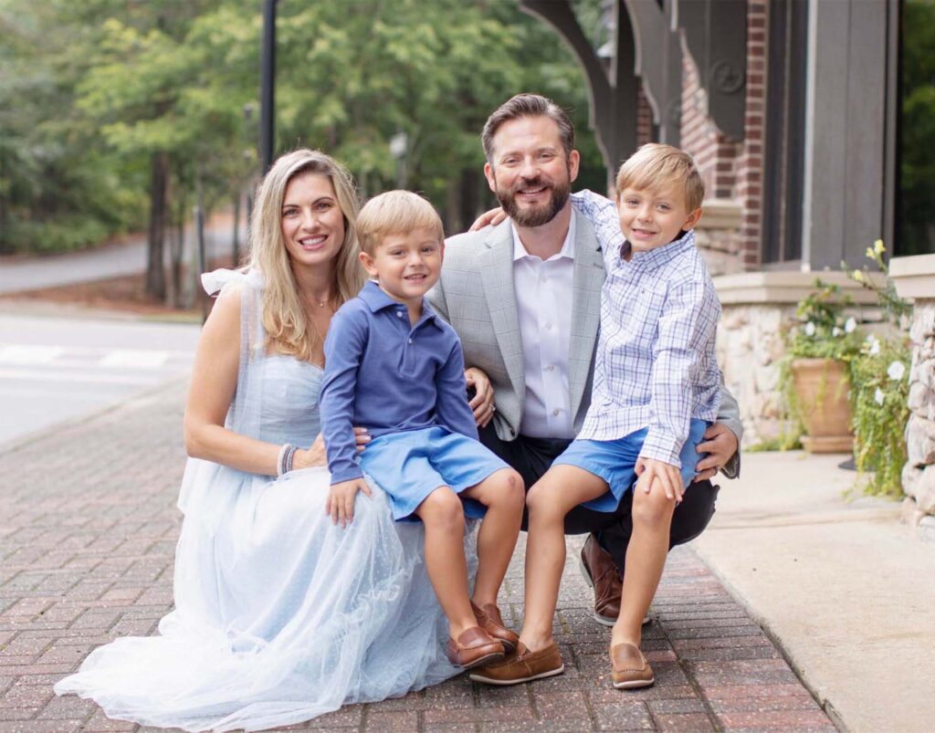 family photo of Dr. Hall and his two kids and wife