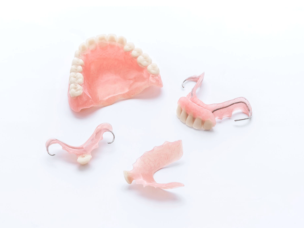 different types of dentures on a white background